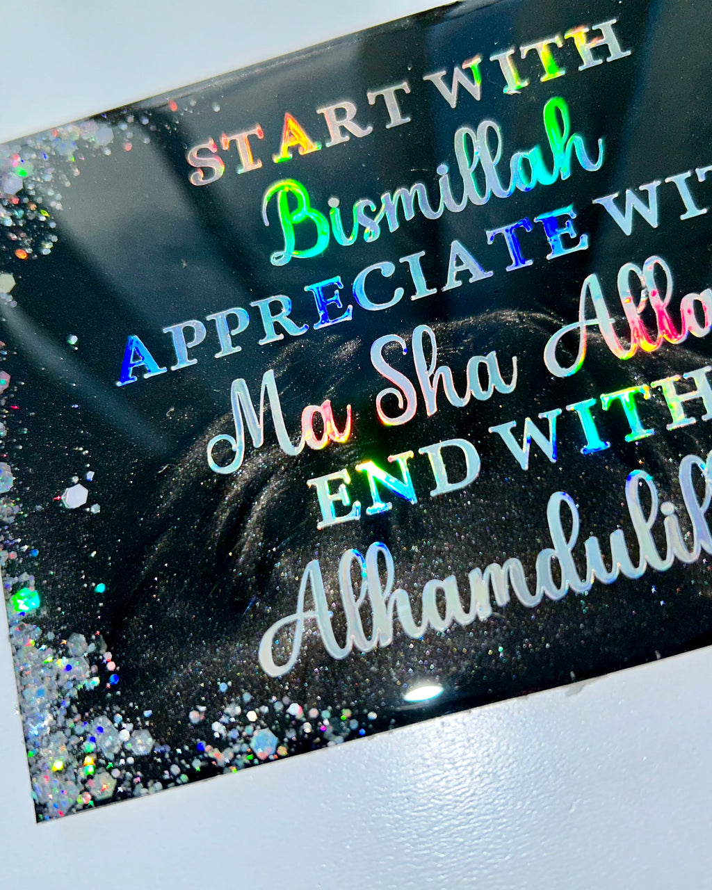 Decorative card with colorful text on a black background