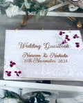 Personalised 3d real dried flower arrangement wedding ring tray and a matching guestbook with foiled page