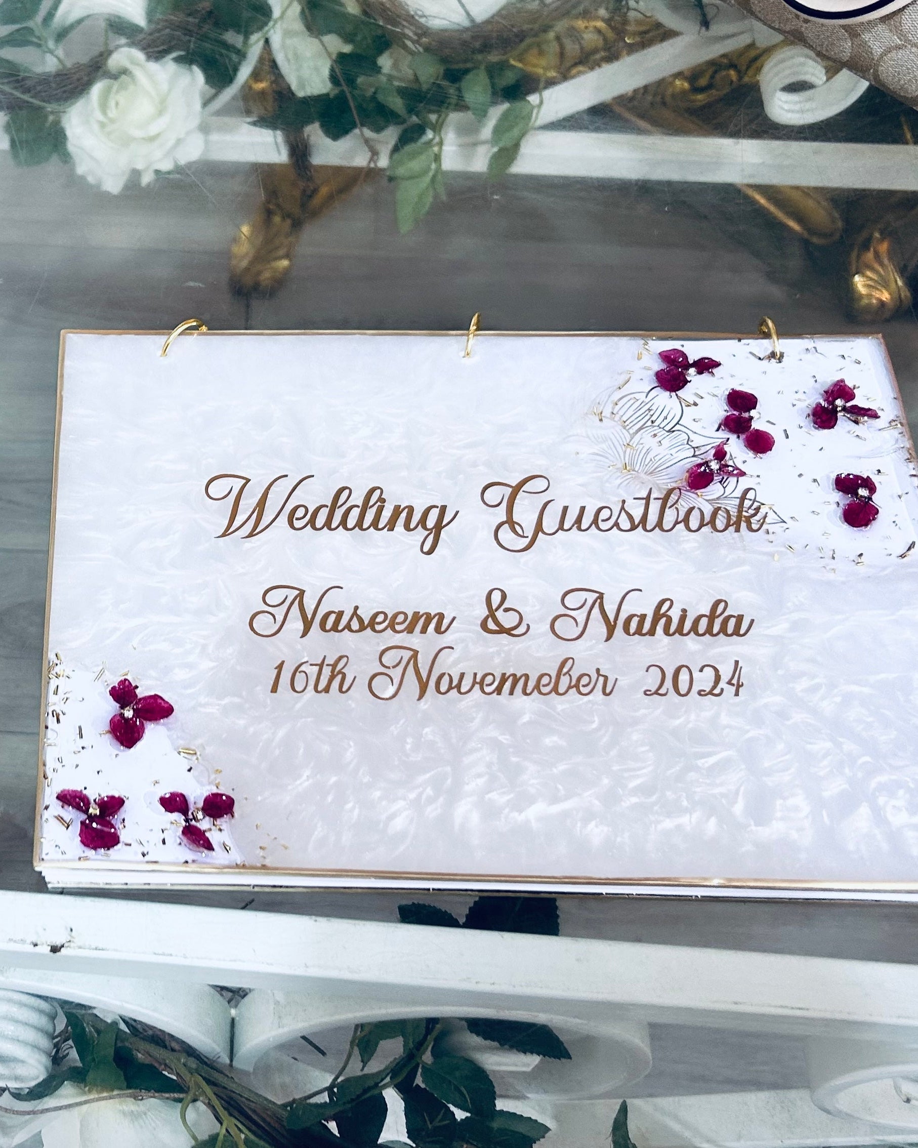 Personalised 3d real dried flower arrangement wedding ring tray and a matching guestbook with foiled page