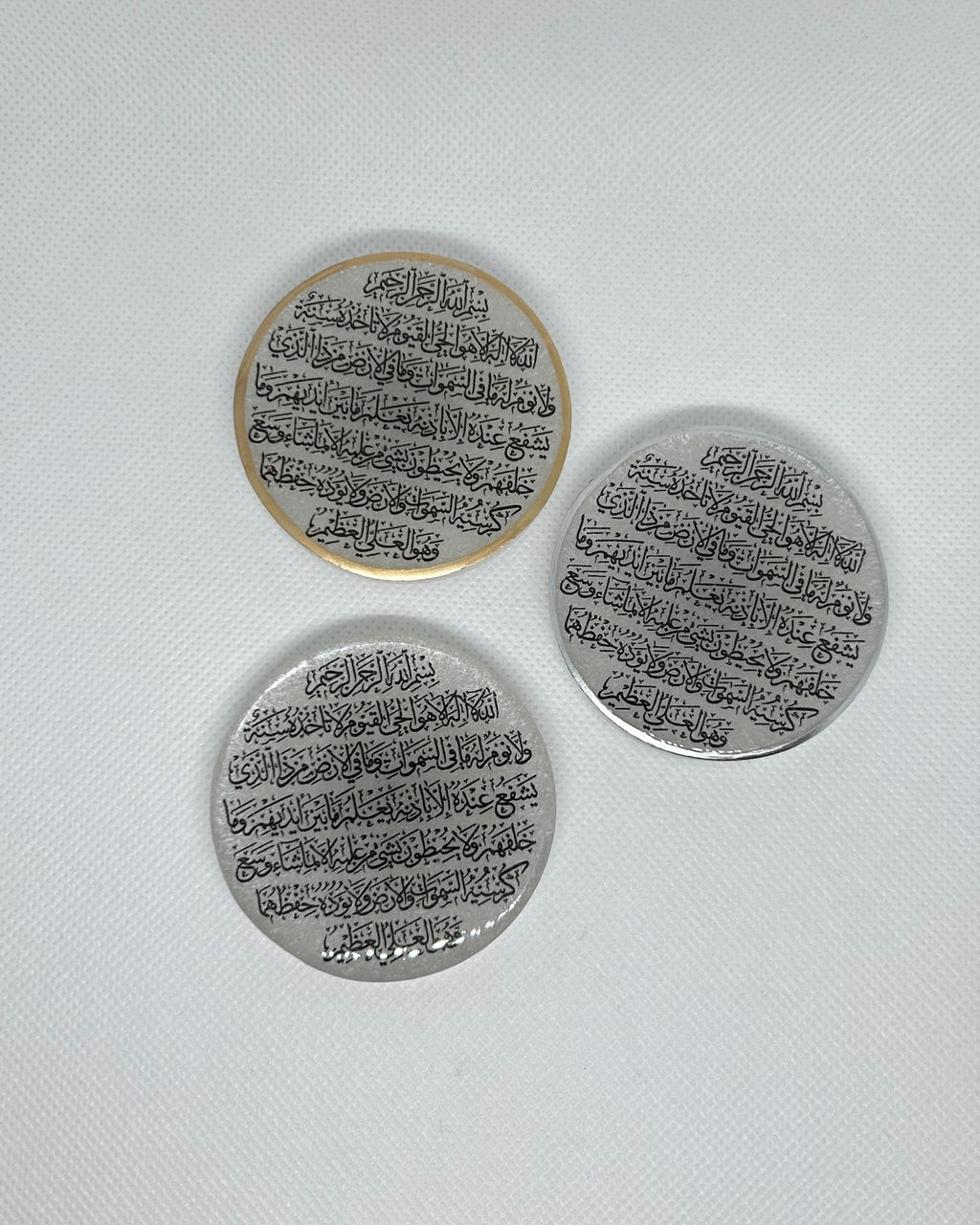 3 circular fridge magnets with the Ayaytul Kuri text